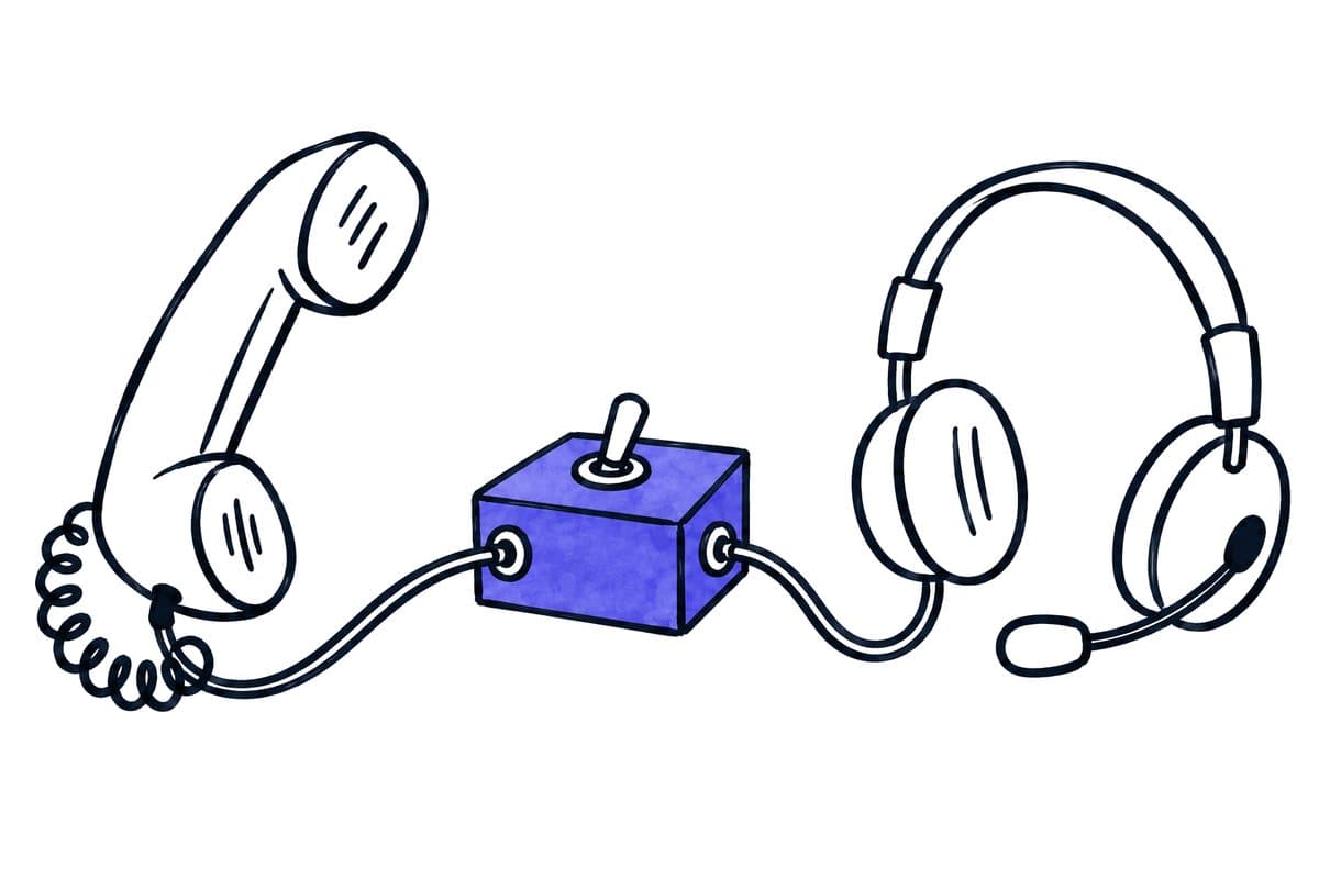 Illustration: a telephone receiver and a headset connected through a switch box