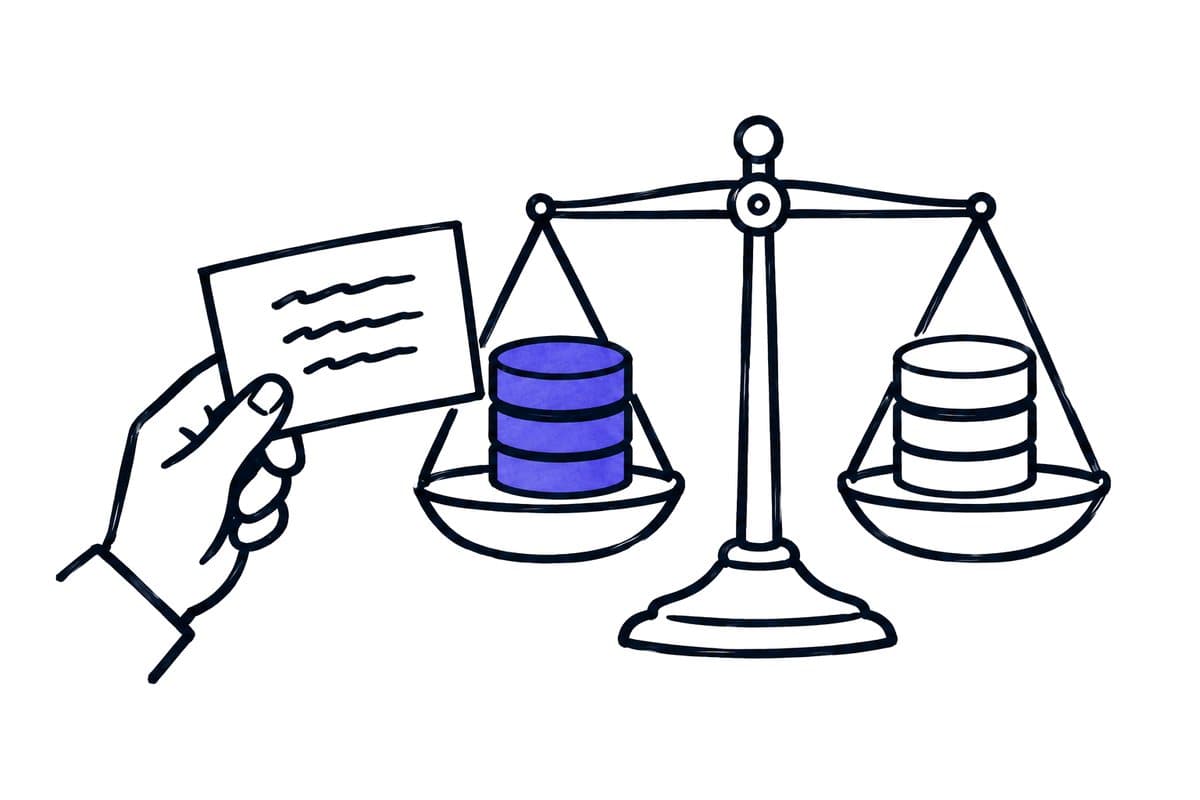 a hand with a criteria card and a pair of scales weighing two databases